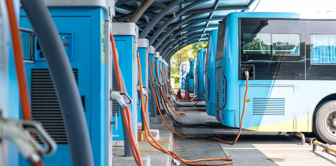 Electric bus at charging station