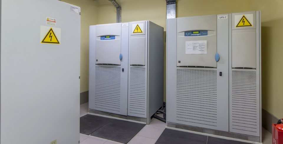 Industrial UPS battery backup systems in a server room