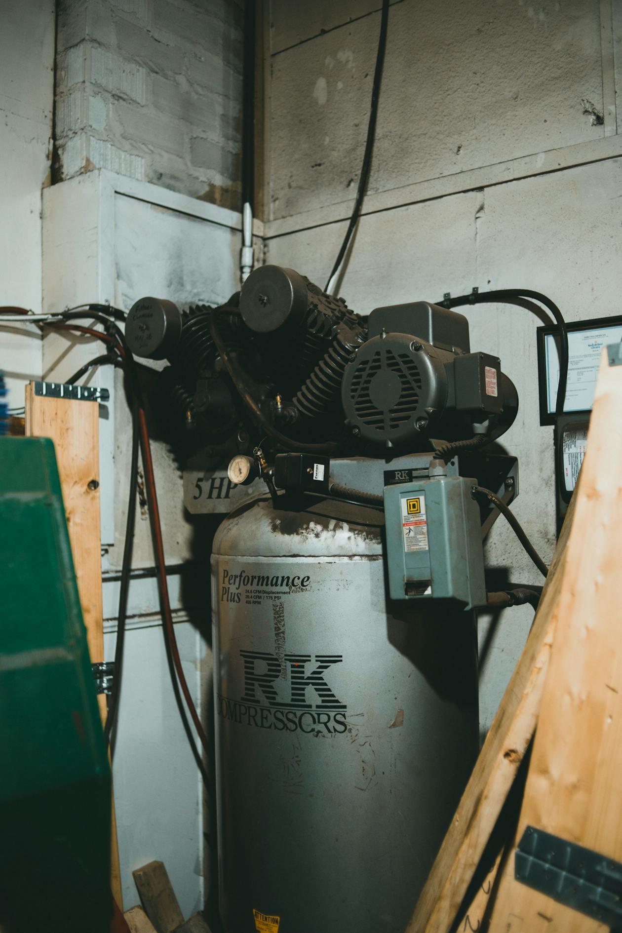 Industrial air compressor in a workshop