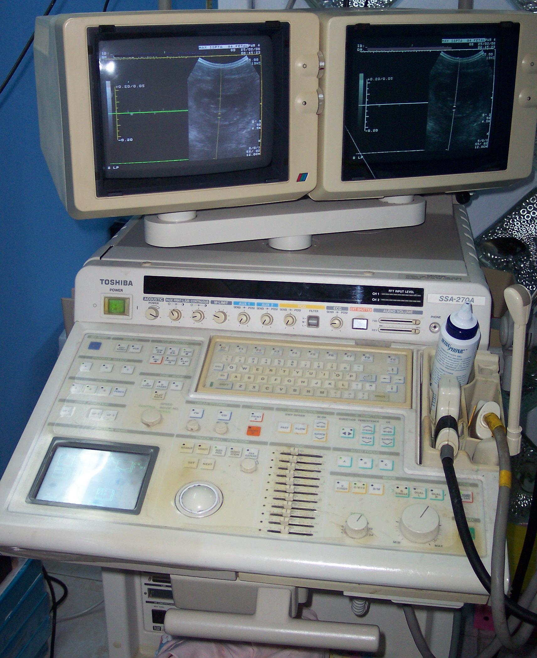 clinicians at a diagnostic ultrasound scanner