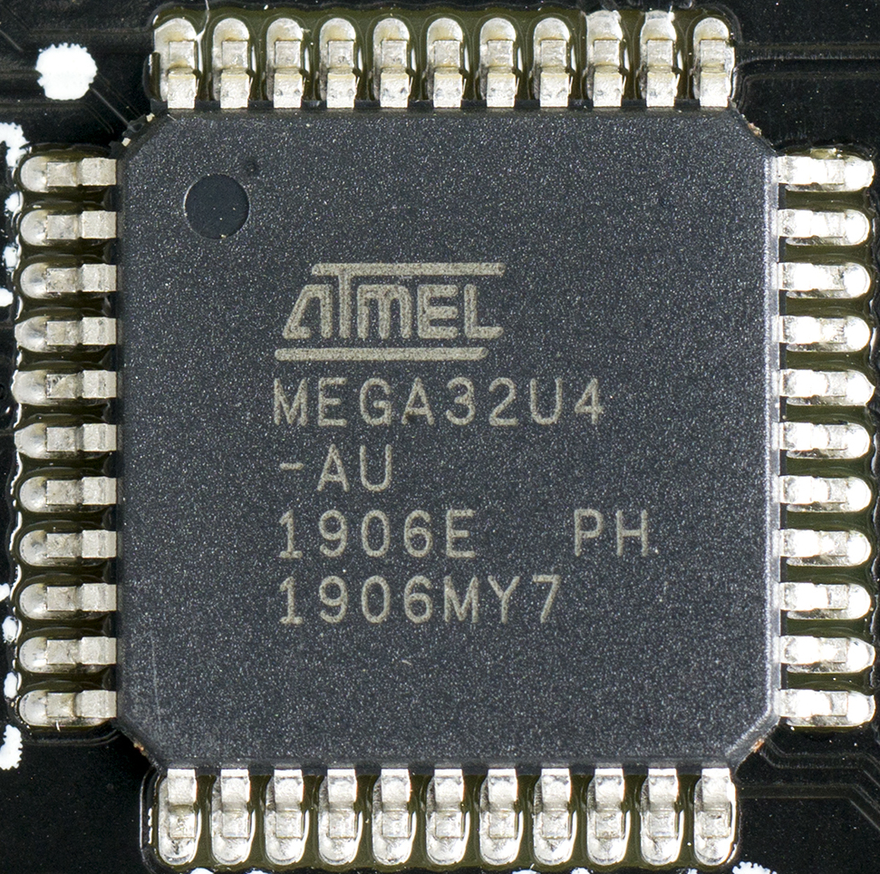 An Atmel ATmega32U4, an 8-bit AVR microcontroller in a TQFP package