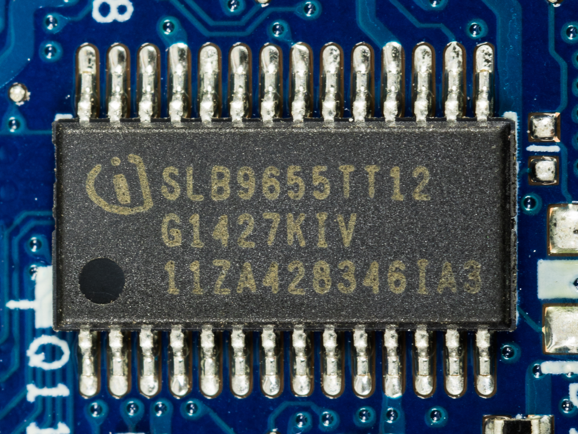 An Infineon SLB9655 Trusted Platform Module chip on a laptop motherboard