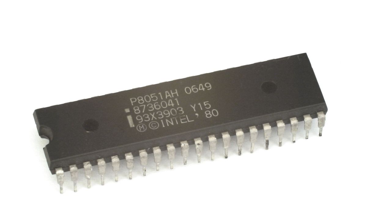 An Intel P8051AH microcontroller in a 40-pin plastic dual in-line package, its part markings visible on the black case.