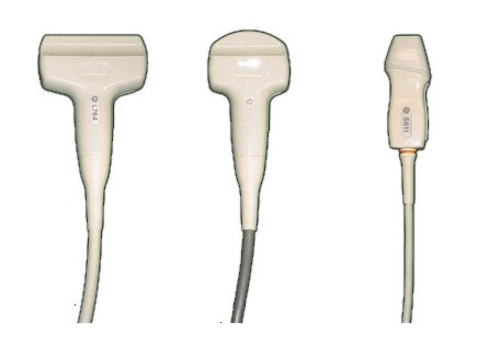 Three ultrasound probe faces side by side: a wide linear array, a curved convex array, and a small phased array.
