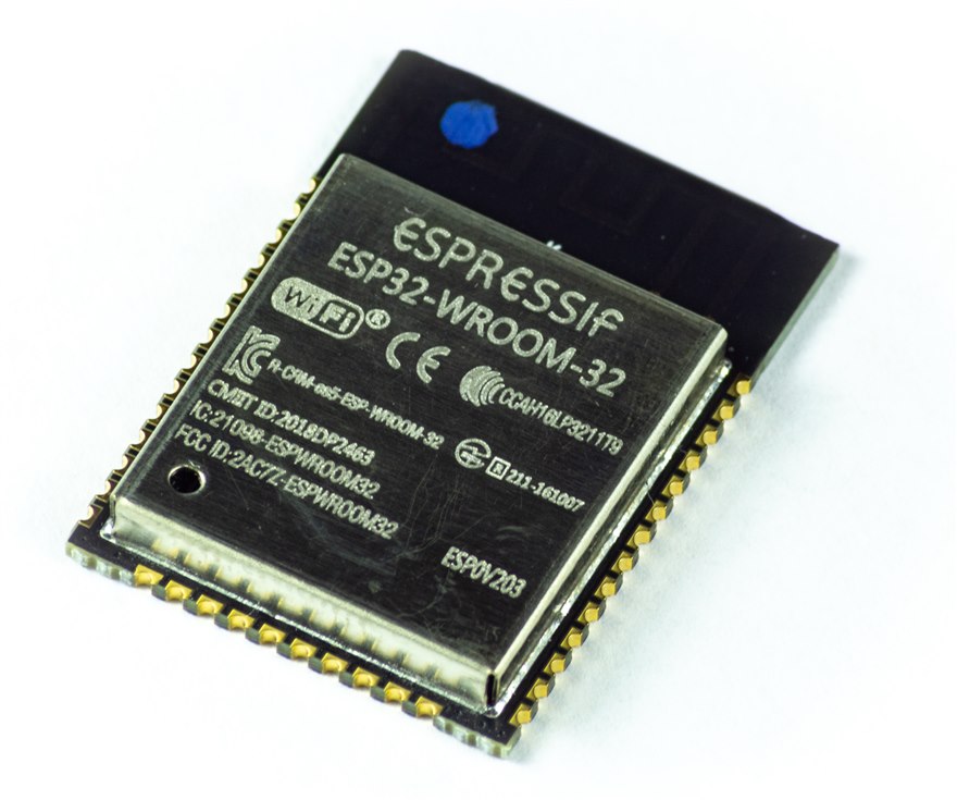 An Espressif ESP32-WROOM-32 module, a metal-shielded WiFi and Bluetooth SoC with FCC, CE and IC certification marks on the can.