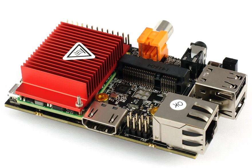 An i.MX-based single-board computer with the application processor under a finned heatsink and its power section on the board.