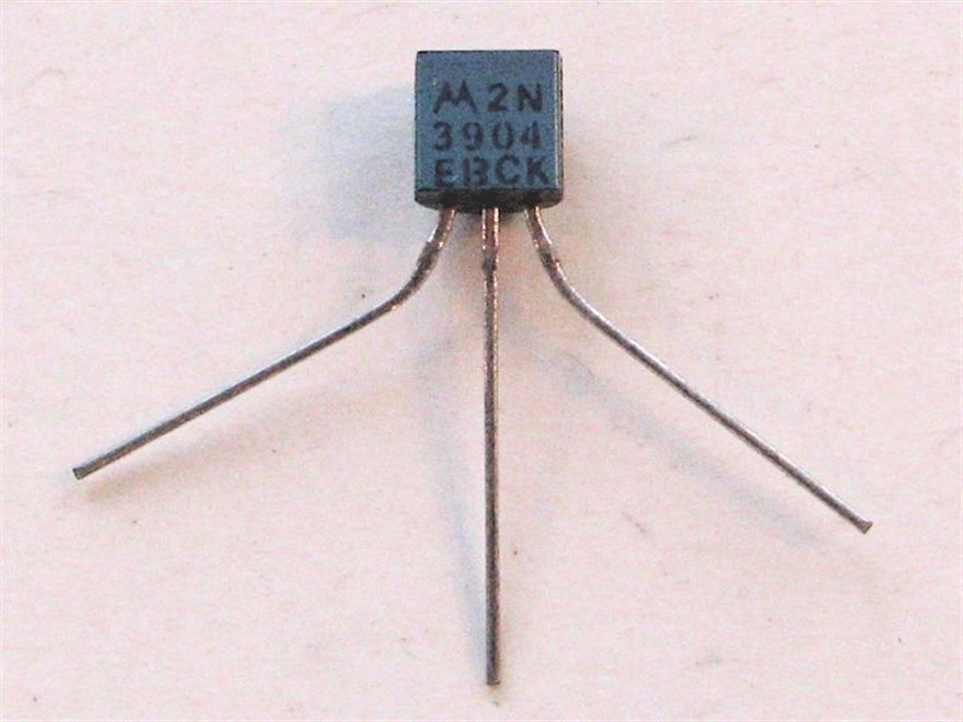 A 2N3904 small-signal NPN transistor in a TO-92 package, the part number marked on the case.