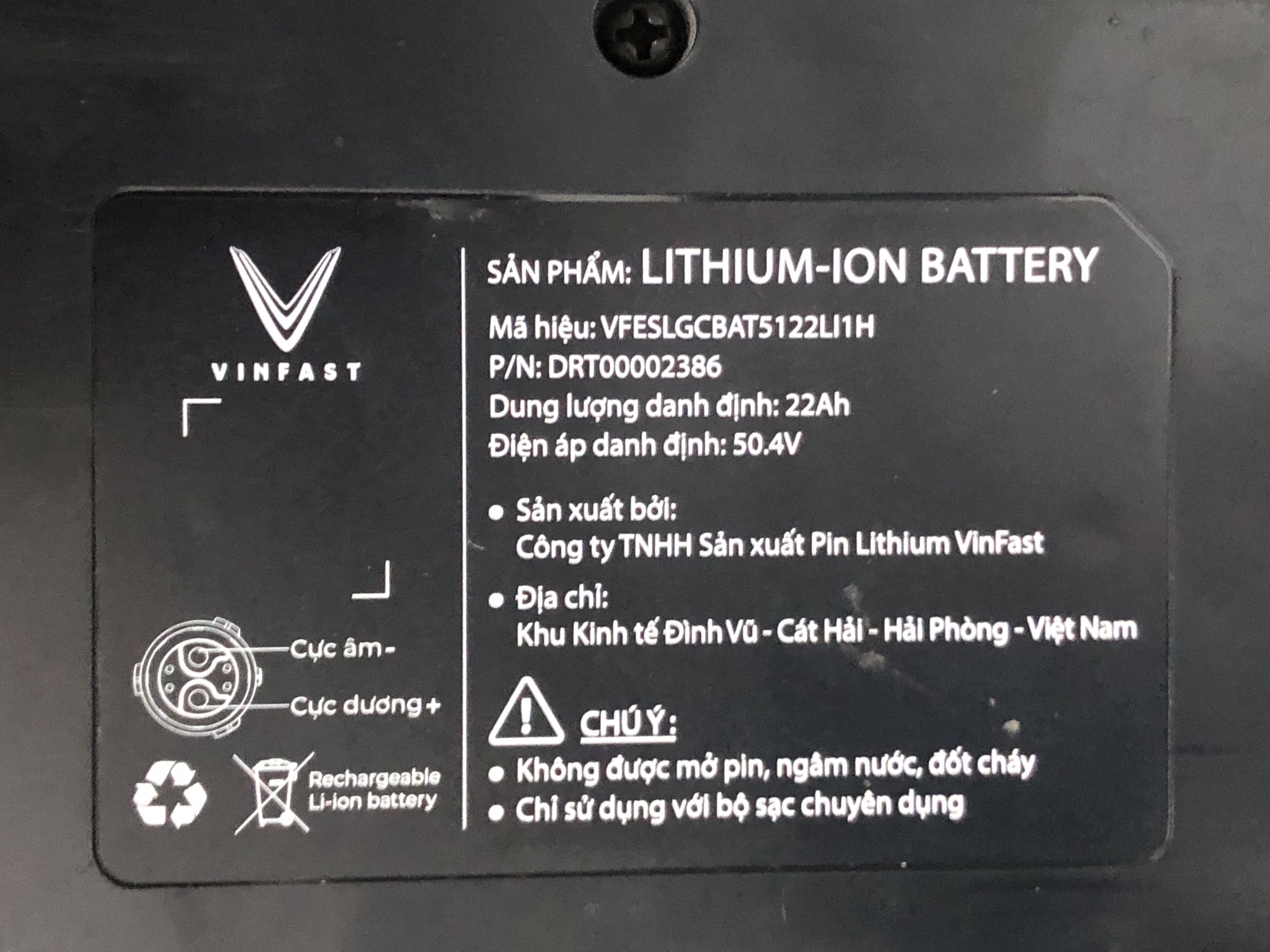 A lithium-ion battery label showing nominal capacity 22 amp-hours and nominal voltage 50.4 volts