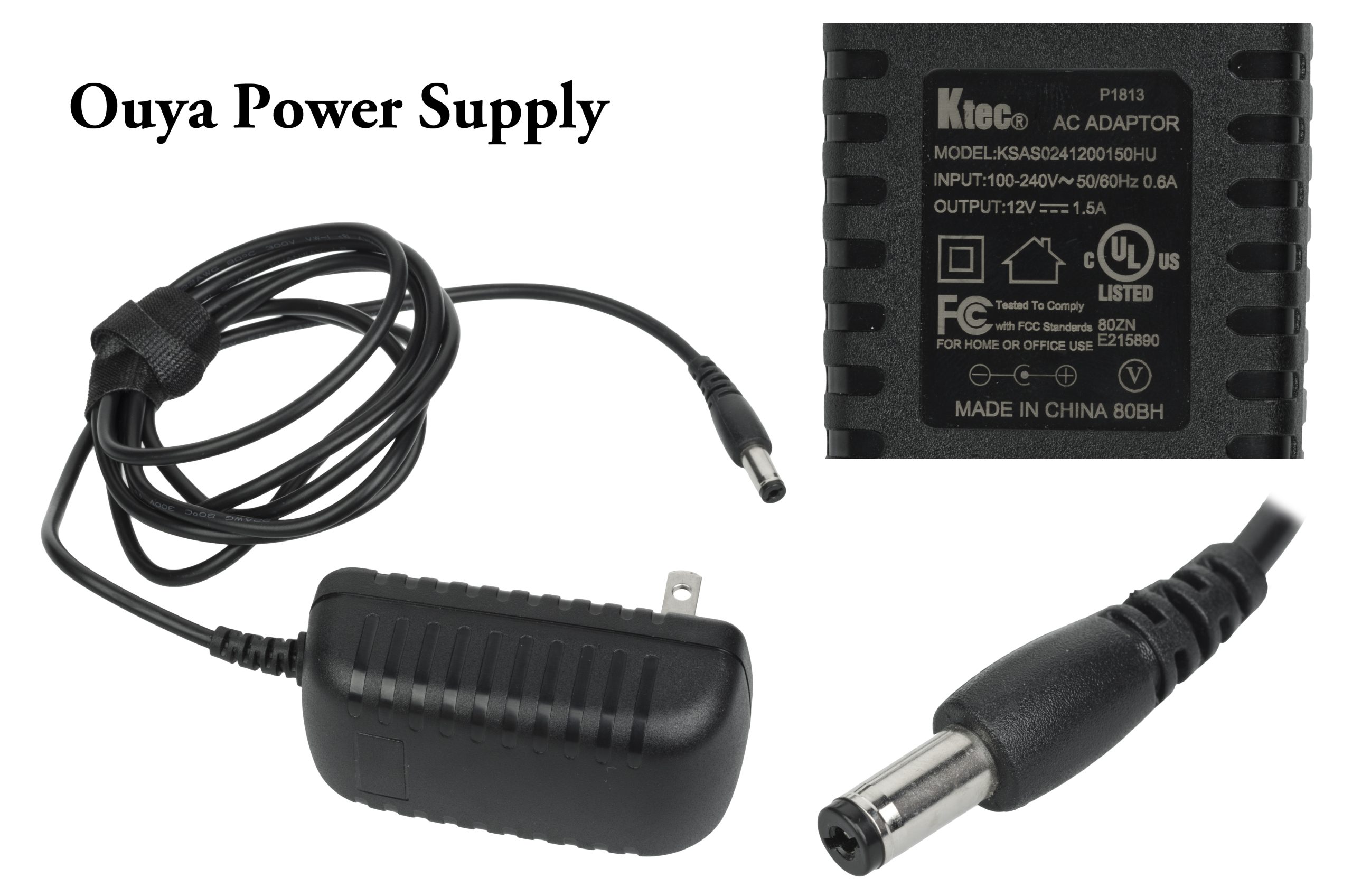 A universal-input AC adapter with a label reading input 100 to 240 volts 50 60 hertz