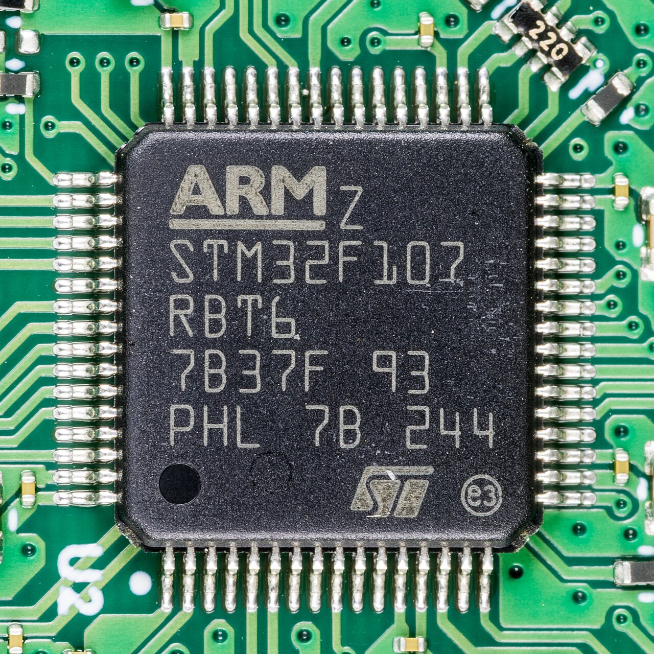 A close-up of an STM32F107 microcontroller package marking