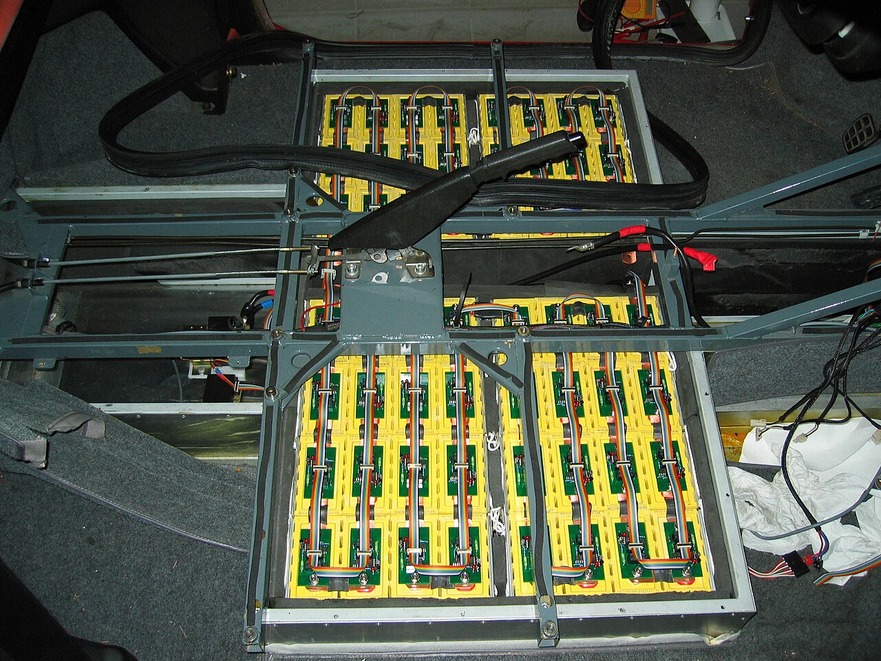 LiFePO4 cells wired in series inside an electric vehicle conversion