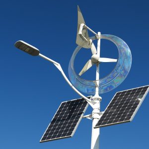 Hybrid solar and wind street light head with LED luminaire