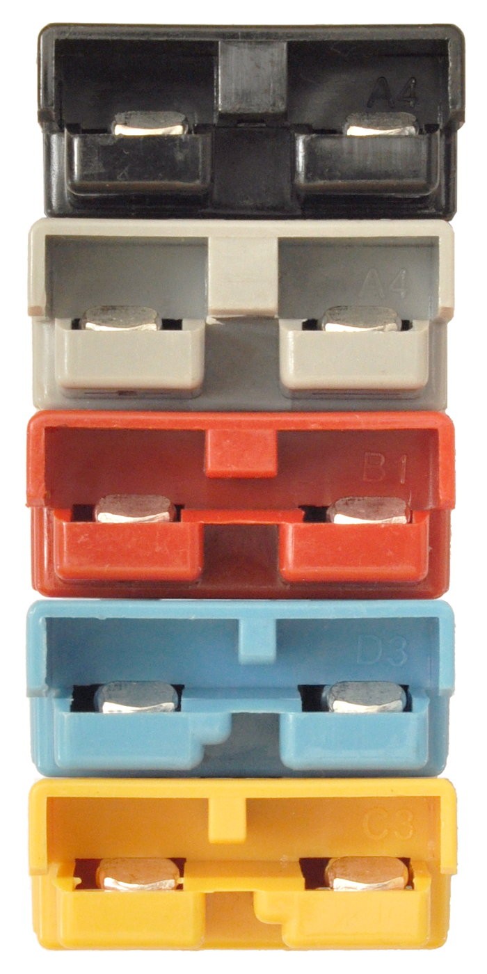 Five Anderson SB50 connector blocks in black, grey, red, blue and yellow, each with a different keying notch position